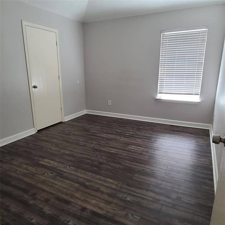 Secondary bedroom also has laminated flooring