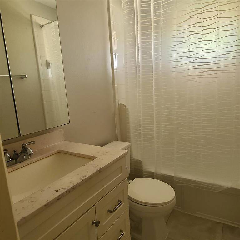 Secondary bath has bath-tub & shower