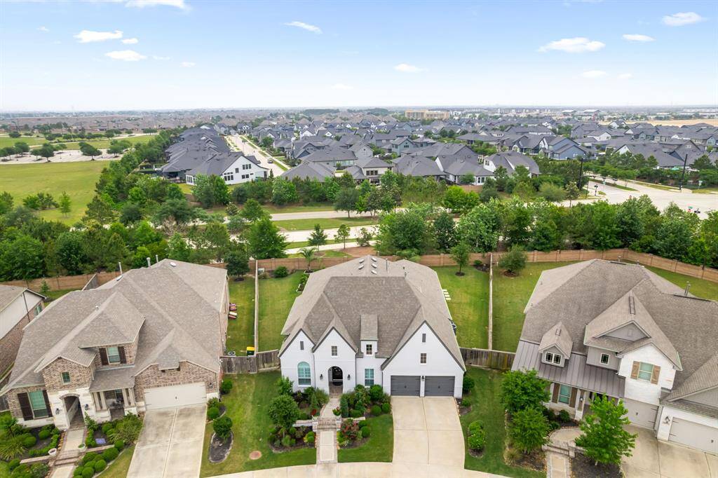 Front aerial shot - This home sits on a street filled with well-cared-for beautiful homes.