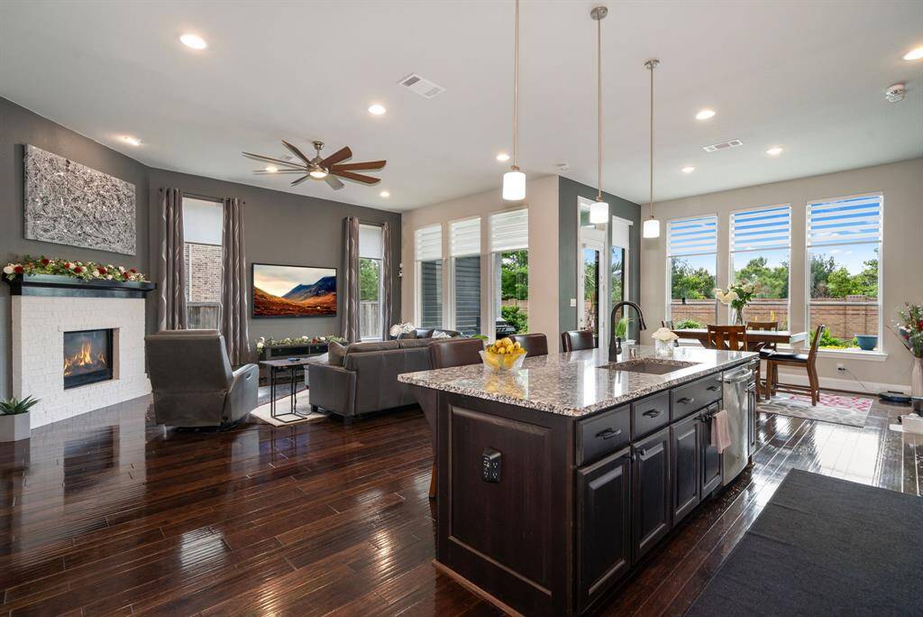 Come make this space yours - add your own personal touch. Lots of windows help open up these main living areas to the outdoors.