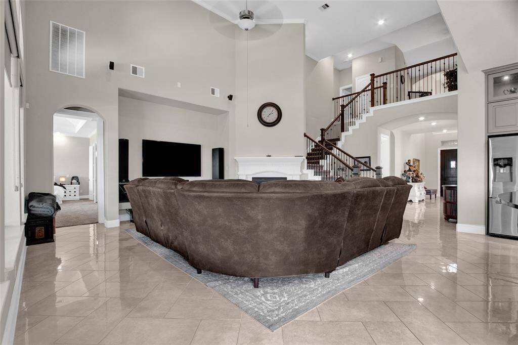 Discover this spacious, sunlit living room, perfectly crafted for comfort and elegance.