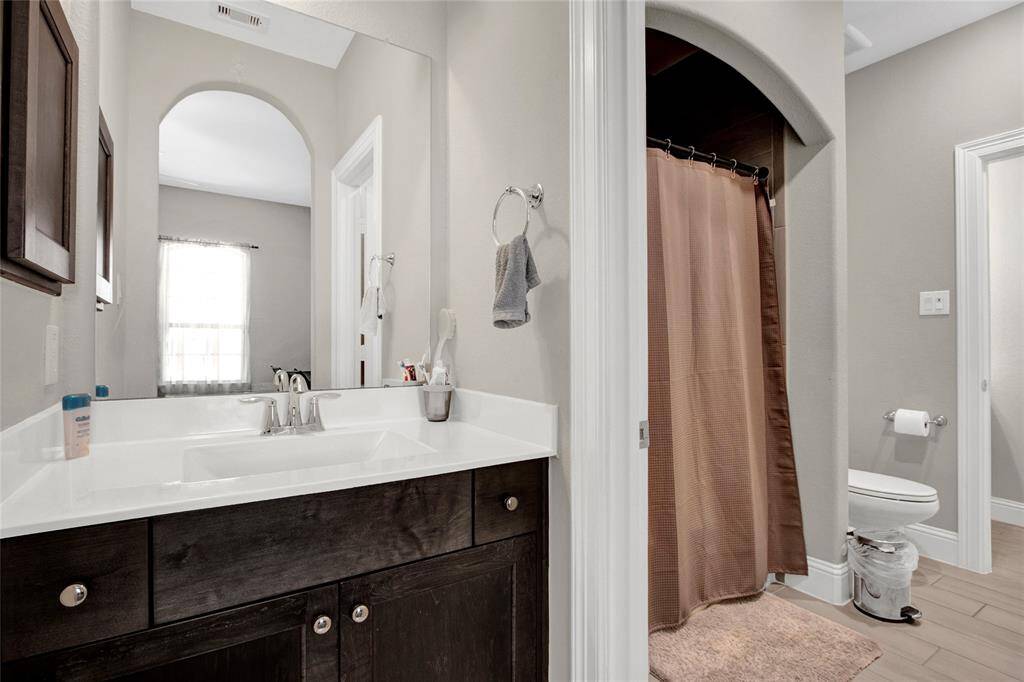 Bedrooms 3 and 4 feature a stylish and practical shared Jack & Jill bathroom.