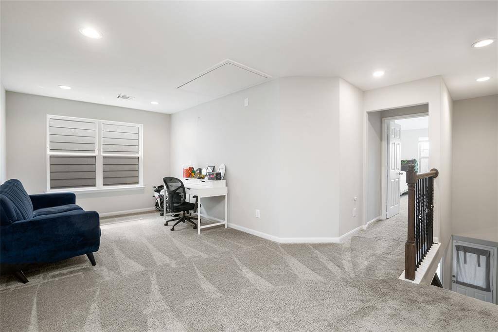 Upstairs you will find a beautiful gameroom, perfect for hanging out with your family, or getting some work done! Plush neutral carpet provides comfort as you walk around!
