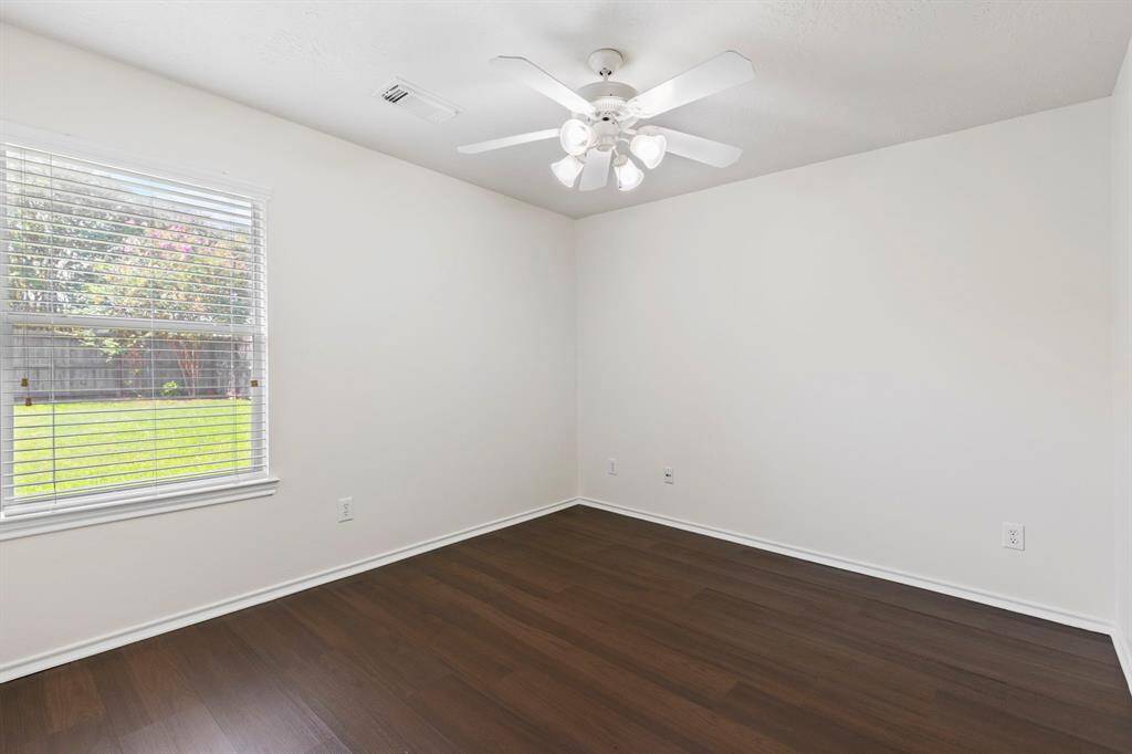 All bedrooms have hard surface flooring, ceiling fan and good size closets.