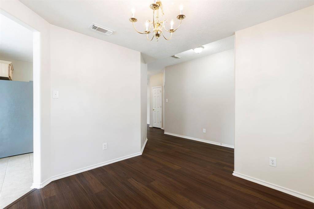 The formal dining room is perfect for hosting dinner parties.