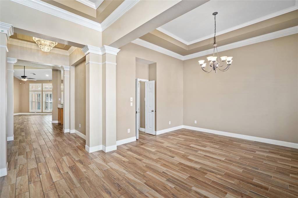 The open layout seamlessly connects each room, highlighting the natural flow from one space to the next. This thoughtful design creates a cohesive and airy atmosphere, making it easy to entertain or relax while enjoying the spacious feel throughout.