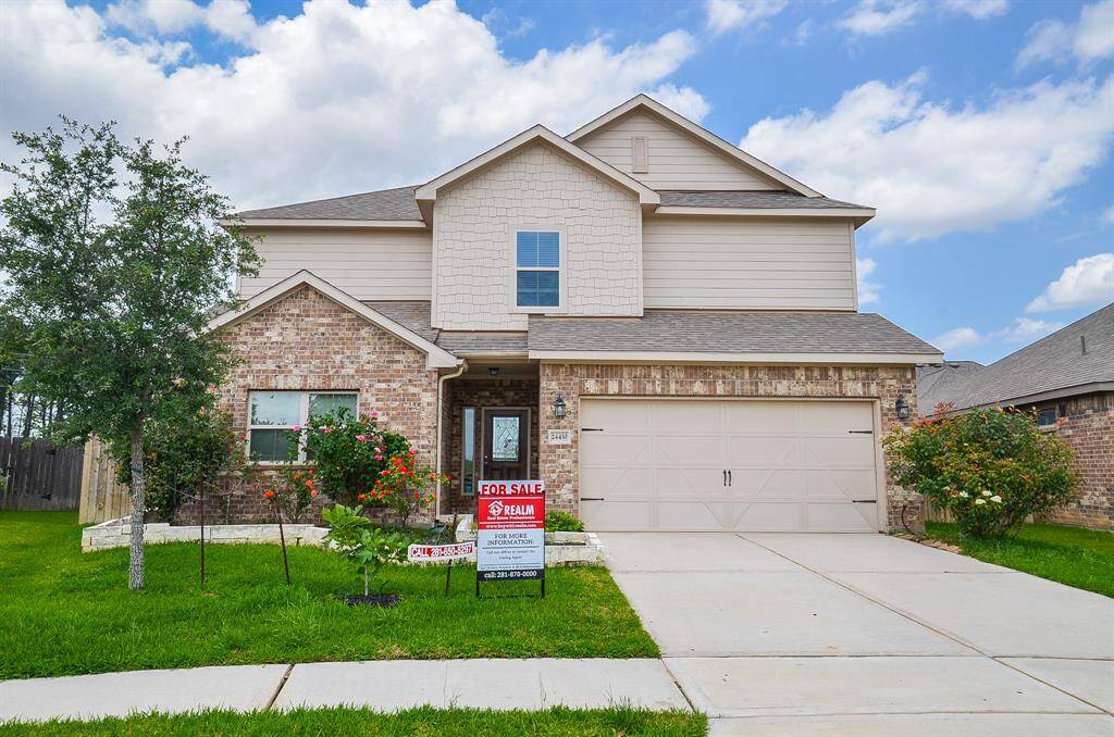 Yes, even homes have personalities! This one is friendly, trim and inviting! This 2-story, brick beauty is located in a desirable corner lot at 24430 Vittorio Wood Lane, Katy, in the lush Katy Lanes neighborhood.