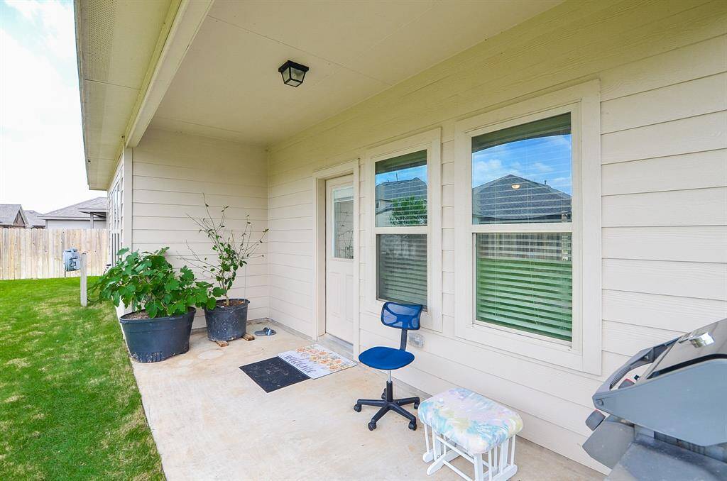 The entire back property is surrounded by privacy fencing.