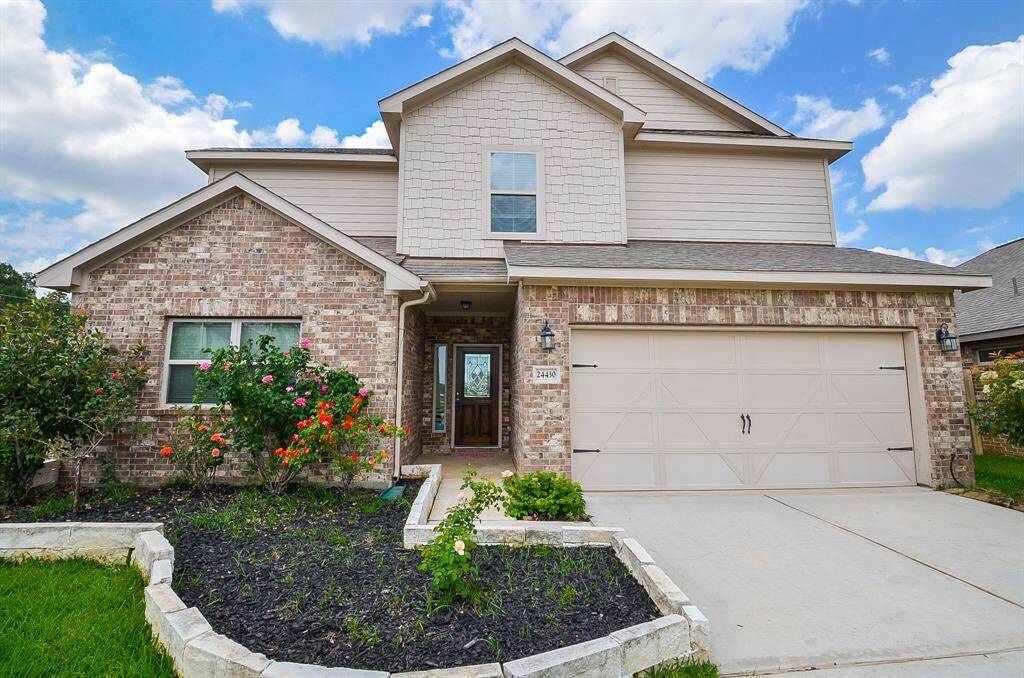 Artisan like brick elevation lines the spacious covered front entrance.