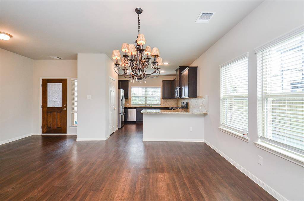 Picture your lovely dining pieces under this spectacular chandelier!