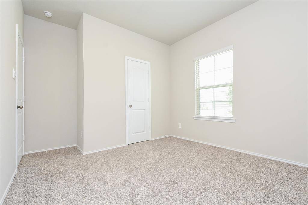 Second bedroom in the first floor near the entrance. Can be use as a office.