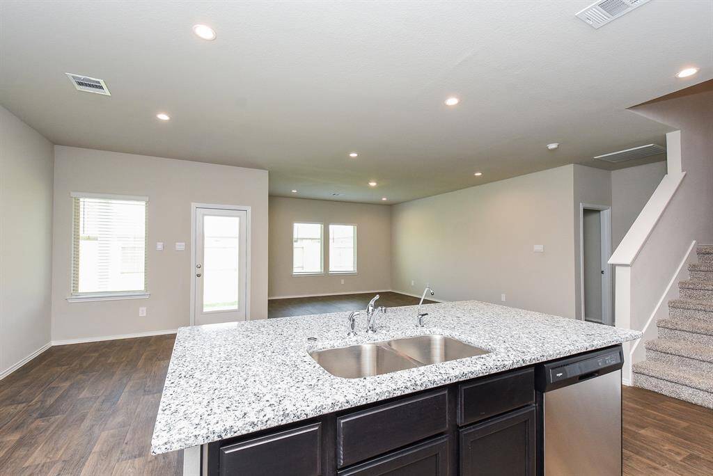 Large Dining Area Opens to Family Room & Island Kitchen