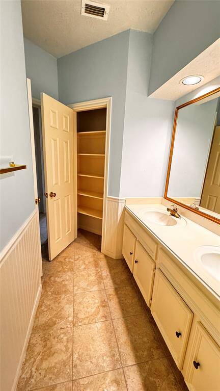 second bathroom with storage