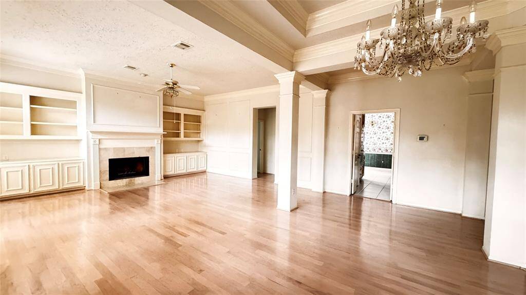 kitchen and master bedroom next to living room area