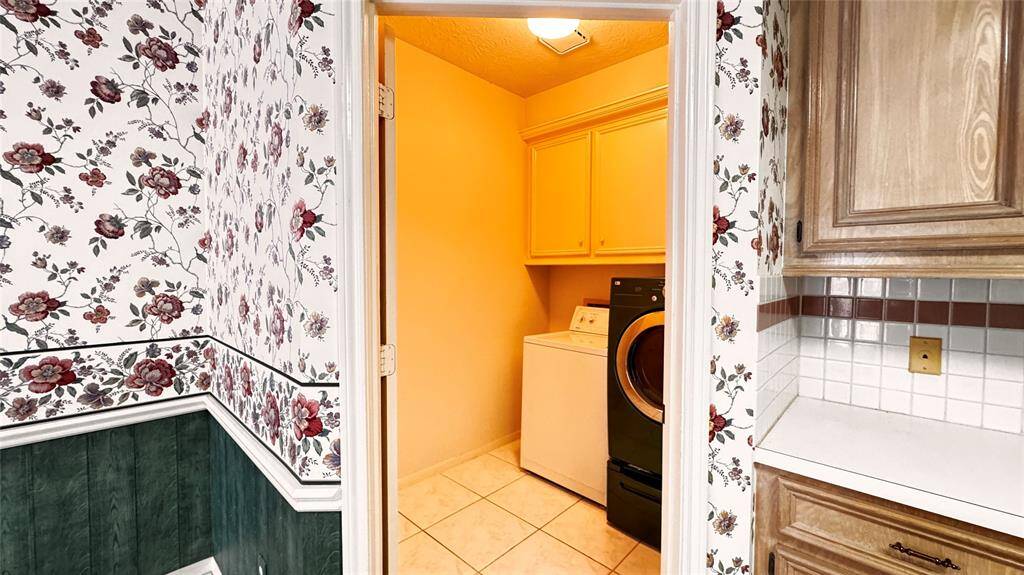 laundry units in kitchen area