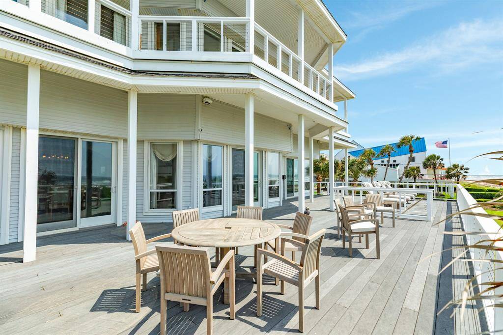Should you prefer to dine or entertain outdoors, simply step out from the living room to the main deck area. This deck is over 1,000 sq ft in size, partially covered and surface decking all composite Trex type materials.