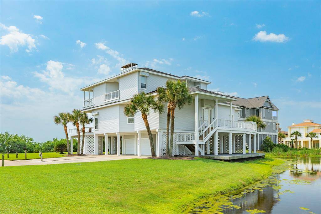 The home also includes a two-car enclosed garage with elevator access. Fantastic beach front home in Pirates Beach West.