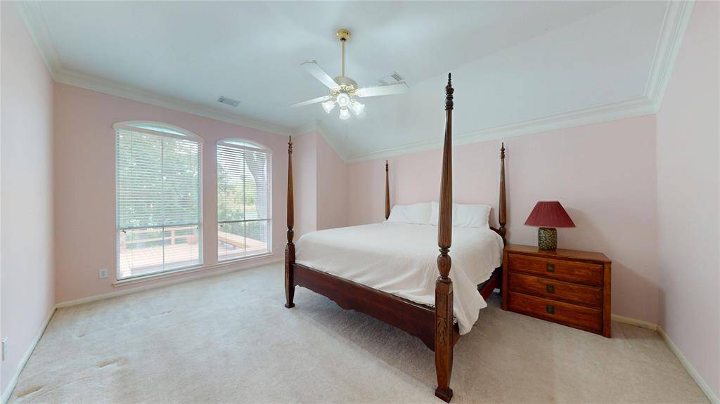The primary bedroom is very spacious!