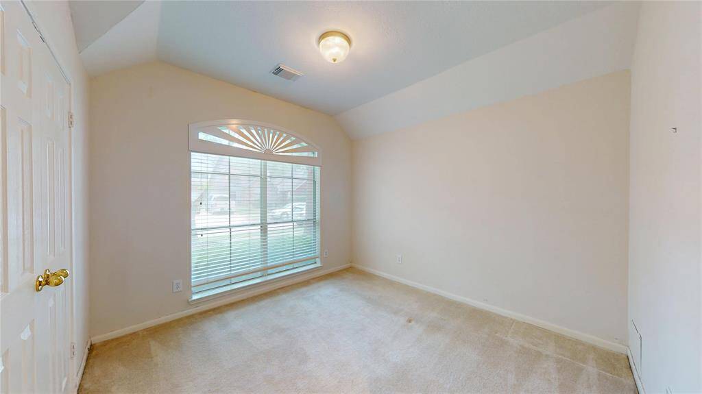 This bedroom is in the front of the home.
