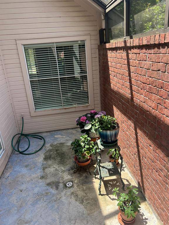 Access to the atrium is through door in the garage