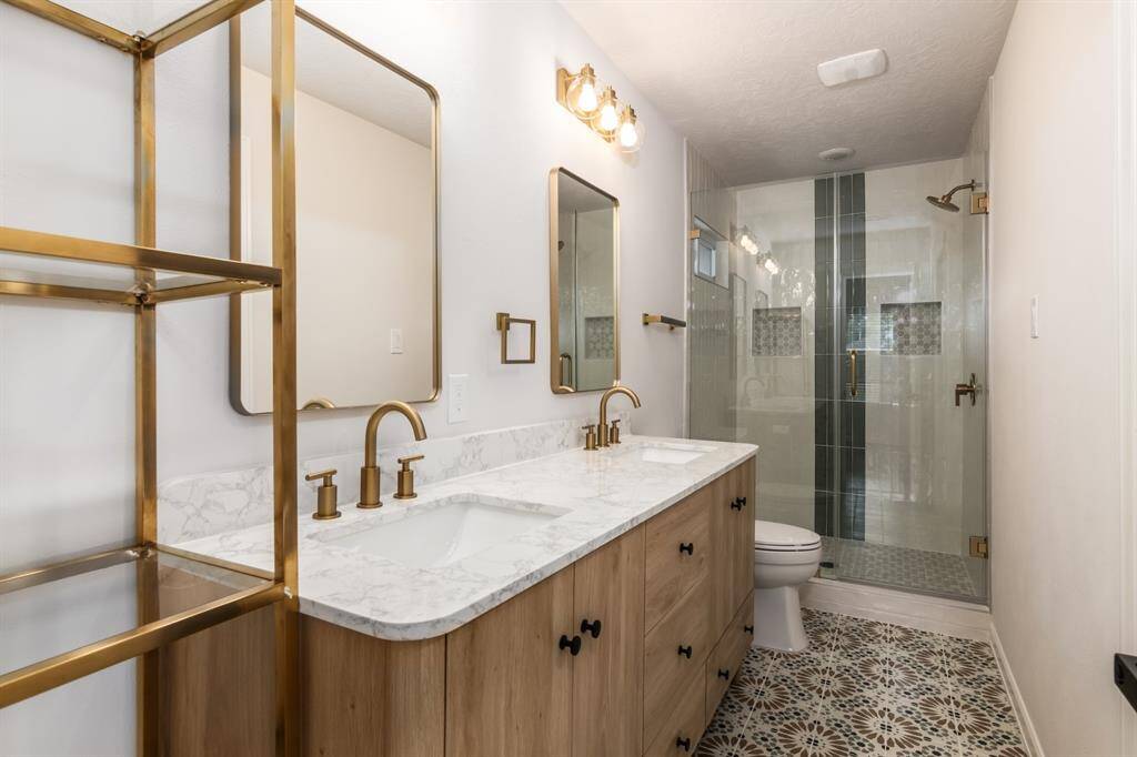 Elegant spacious primary bathroom.