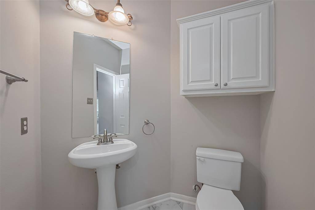 Conveniently situated on the first floor, the guest powder is a practical addition, for hosting guests. Give and enhance the overall convenience of the home for residents and visitors.