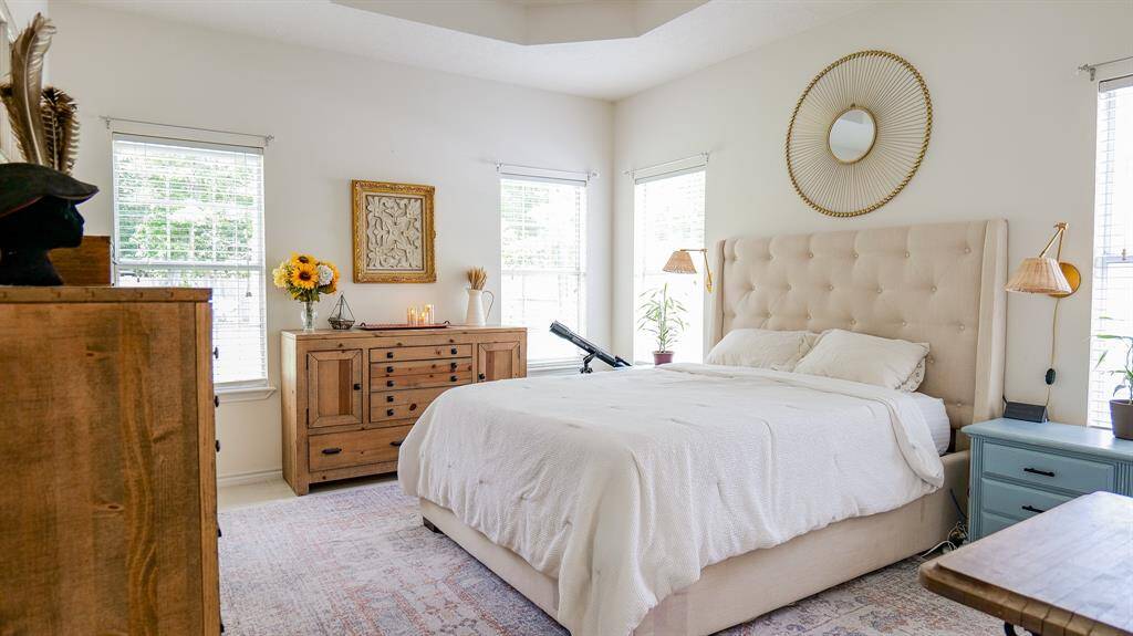 PRIMARY SUITE IS ON THE OPPOSITE SIDE OF HOME FROM THE SECONDARY BEDROOMS