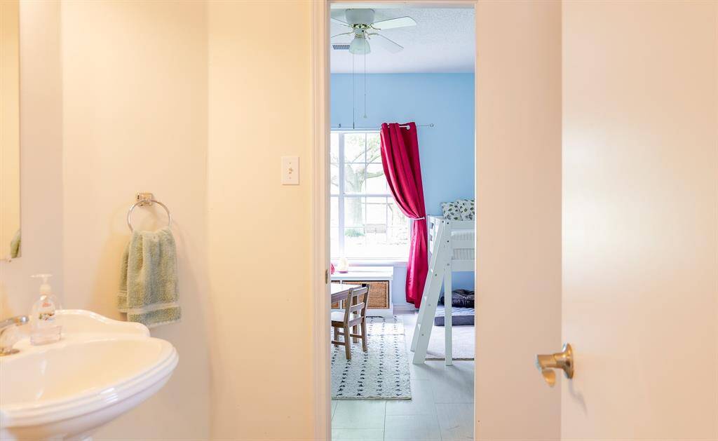 SECOND FULL BATH BETWEEN BEDROOM 2 AND 3