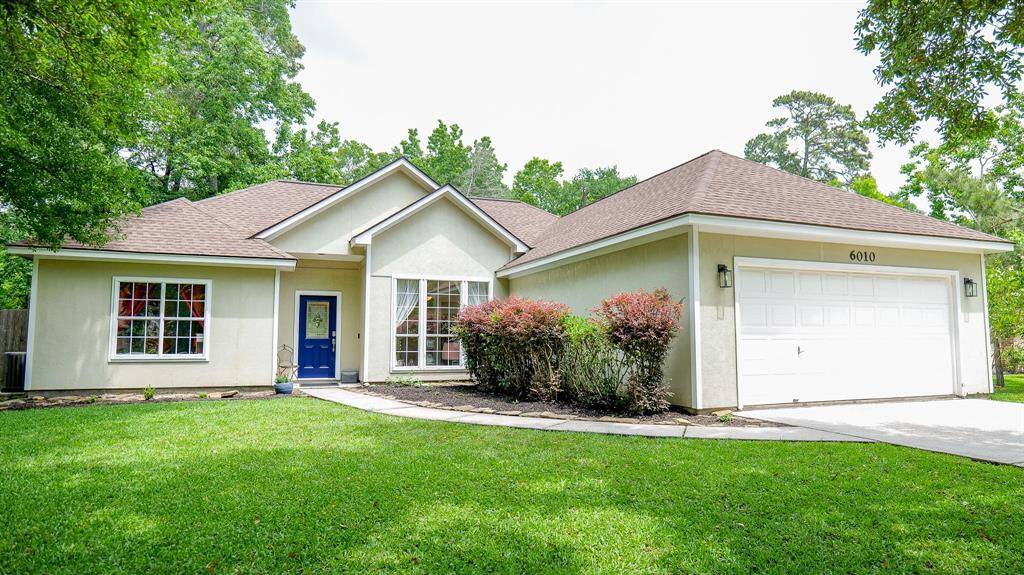 SURROUNDED BY LARGE TREES AND ON LARGE LOTS