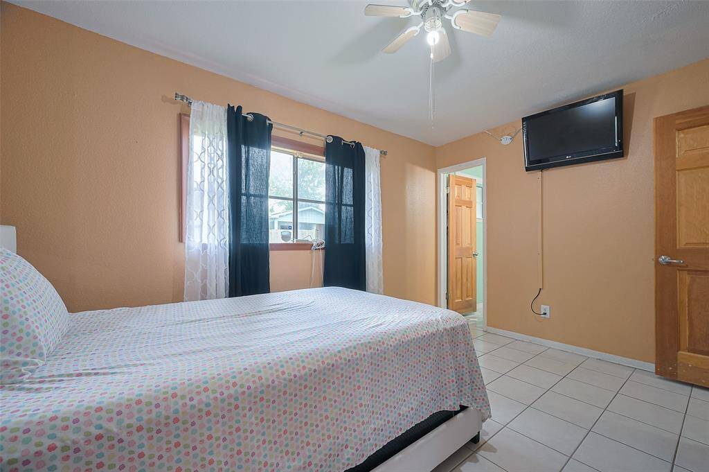 Notice the solid wood doors throughout the interior of the home, adding a touch of craftsmanship and warmth. The owner's suite includes a convenient ensuite bathroom with a commode and sink, offering privacy and ease.