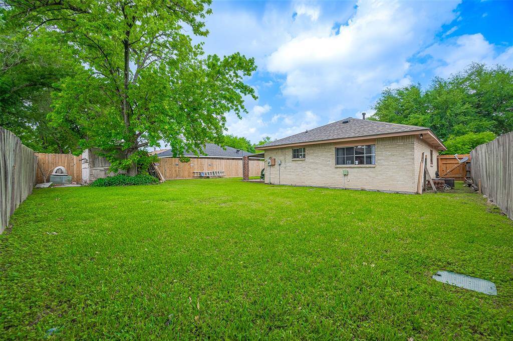 If you're looking for a sizeable yard with room for a swimming pool, this home offers ample space and endless possibilities. There's plenty of room for a vegetable or rose garden, with lots of sunshine to help things grow. Whether you dream of creating a backyard oasis or simply enjoying the open space, this yard is ready to meet your needs.