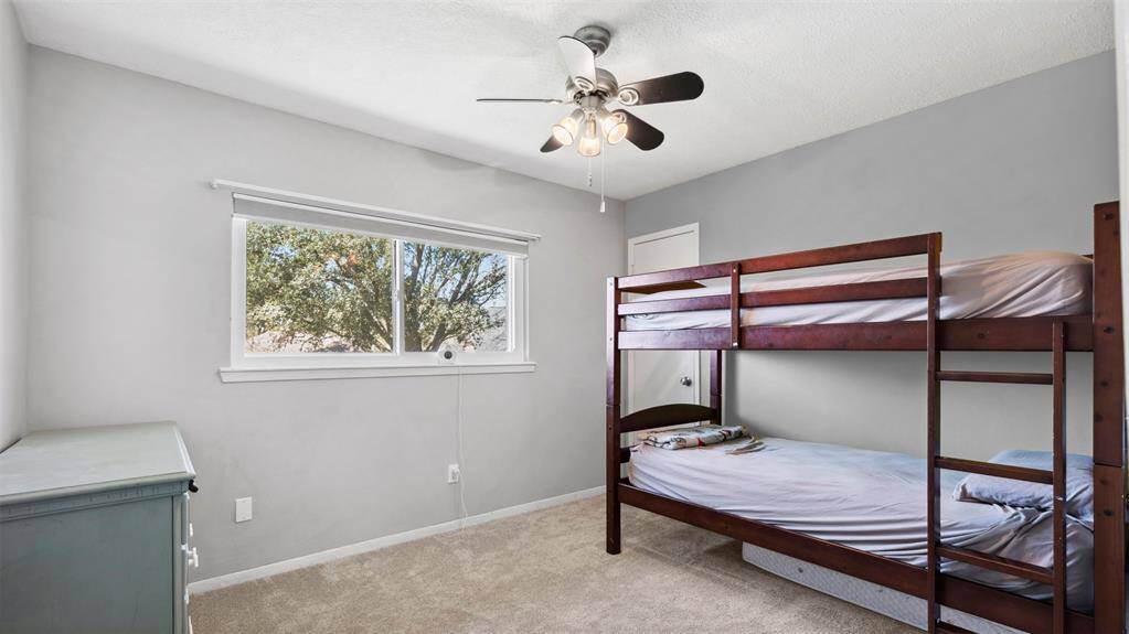 The remaining three bedrooms are generously sized, offering plenty of room for family, guests, or a home office. A well-appointed full bath is conveniently located nearby.