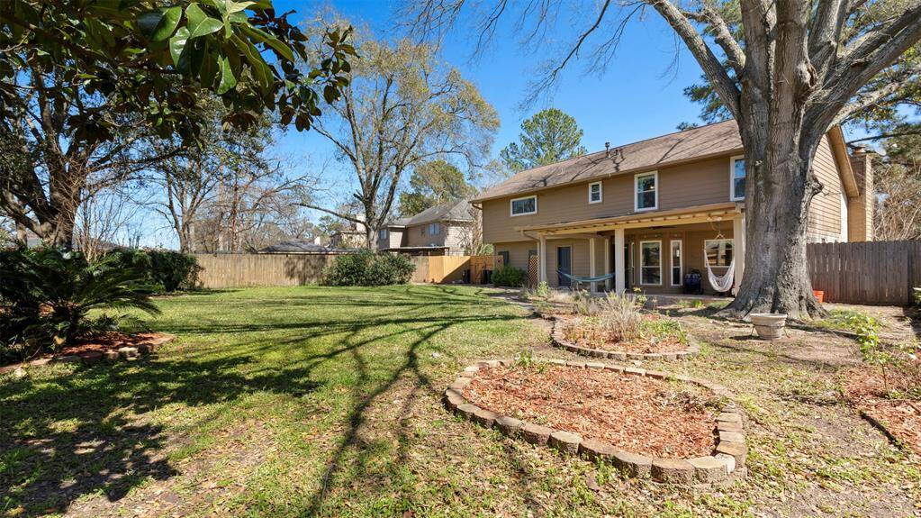 Step outside to your private covered patio, an ideal spot for outdoor dining, lounging, or entertaining. The expansive yard provides endless possibilities for gardening, play, or even adding a pool. It’s a true outdoor oasis.