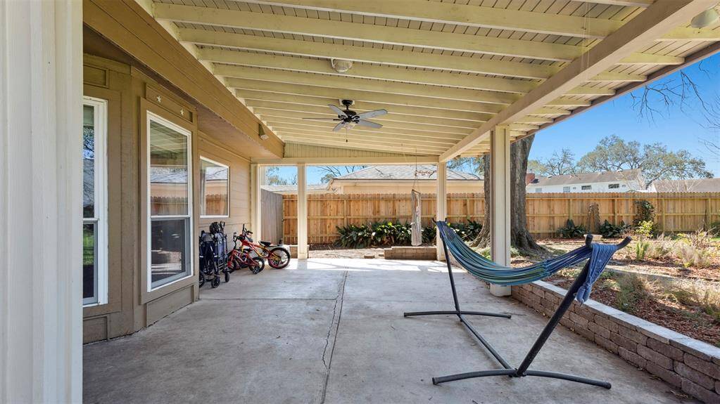 Step outside to your private covered patio, an ideal spot for outdoor dining, lounging, or entertaining. The expansive yard provides endless possibilities for gardening, play, or even adding a pool. It’s a true outdoor oasis.