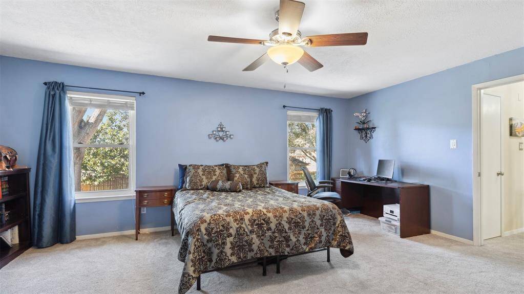 This spacious master bedroom is your retreat, complete with ample space, a serene atmosphere, and large windows that bring in beautiful light. It’s the perfect place to unwind after a long day.