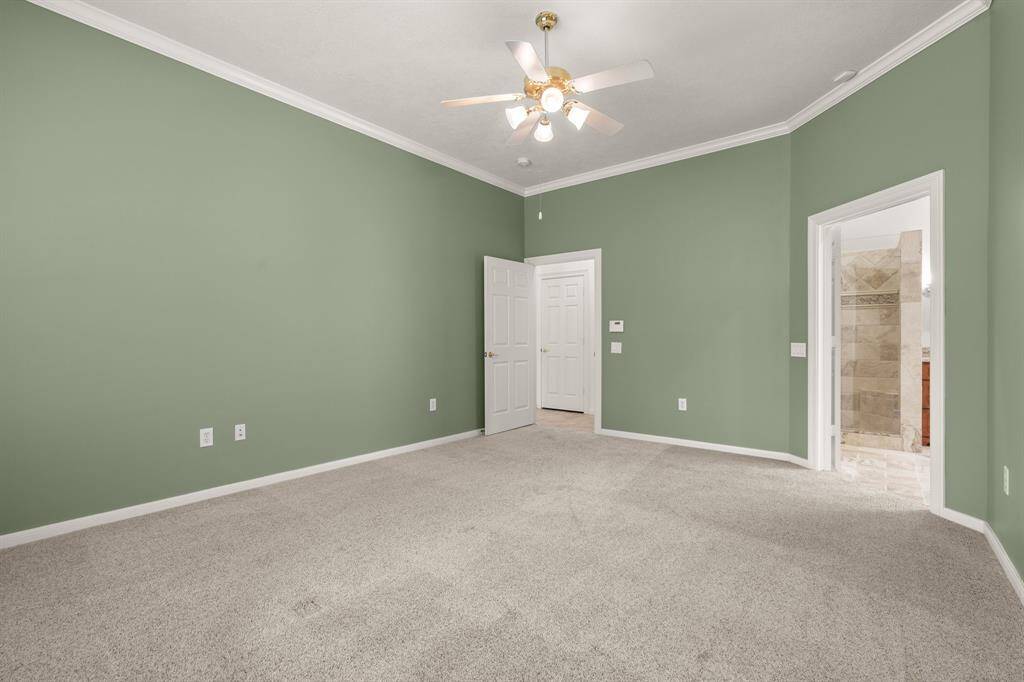 another view of the primary bedroom.