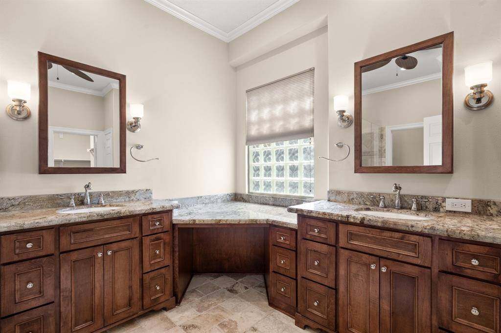 The primary bath was remodeled to include new granite counters, shower, sink and wood medicine cabinet!