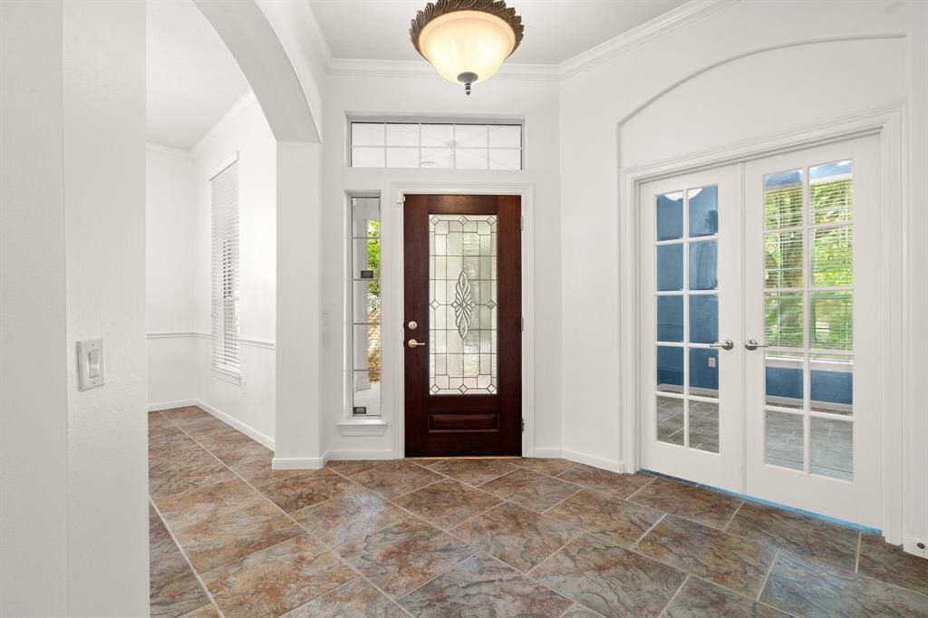 The large foyer is appointed with artisan detail.