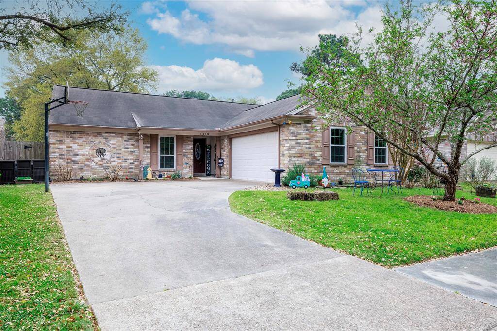 Front elevation and attached two-car garage.