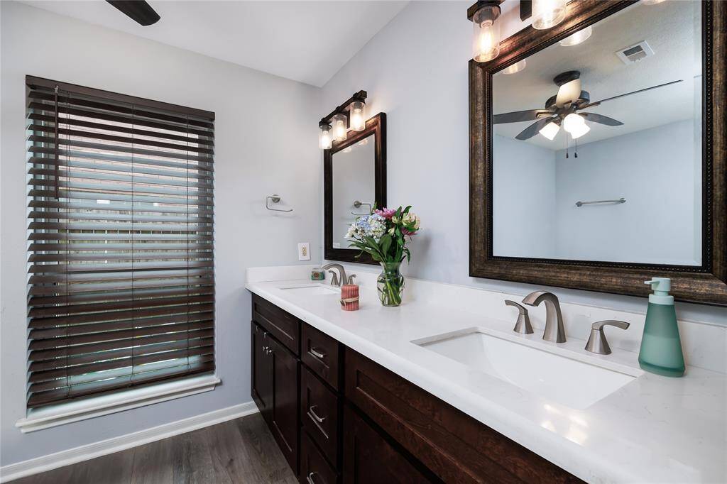 Double vanities in the primary bath.
