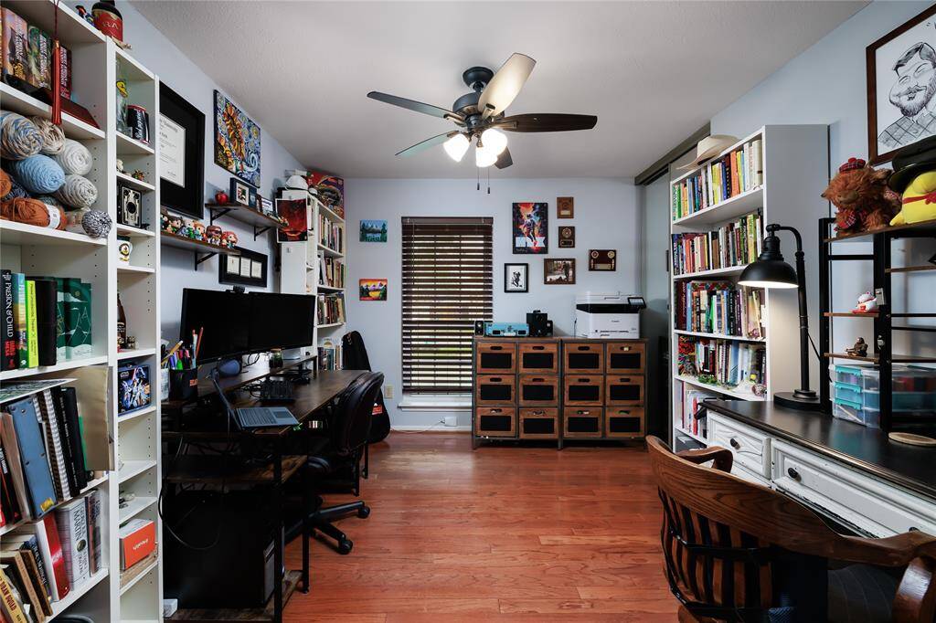 Just off the main living room is this space that is perfect for a home office!