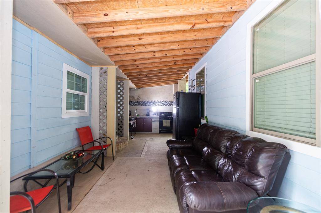 Completely covered back porch!  Imagine the family get togethers were everyone can be together.
