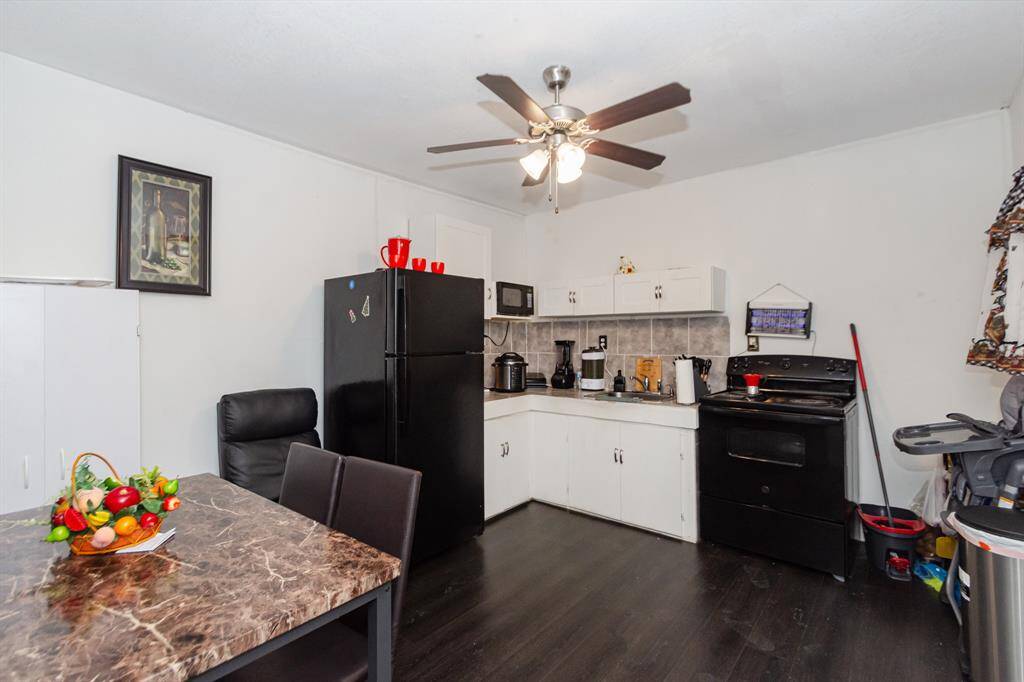 This is the back tiny home with it own kitchen/dining/living areas.