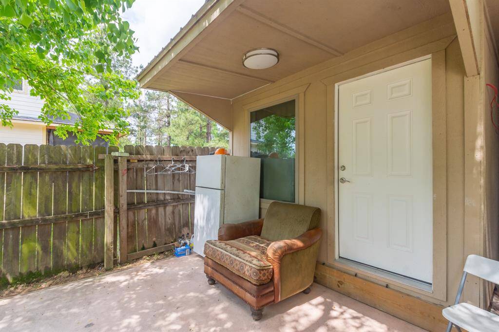 The front tiny home has a covered front porch and central air and heat.