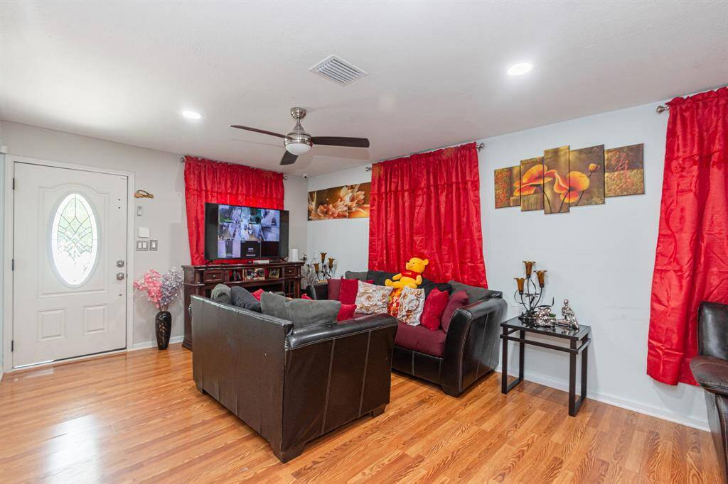 Upon entering you are greeted with an ample size living room area.