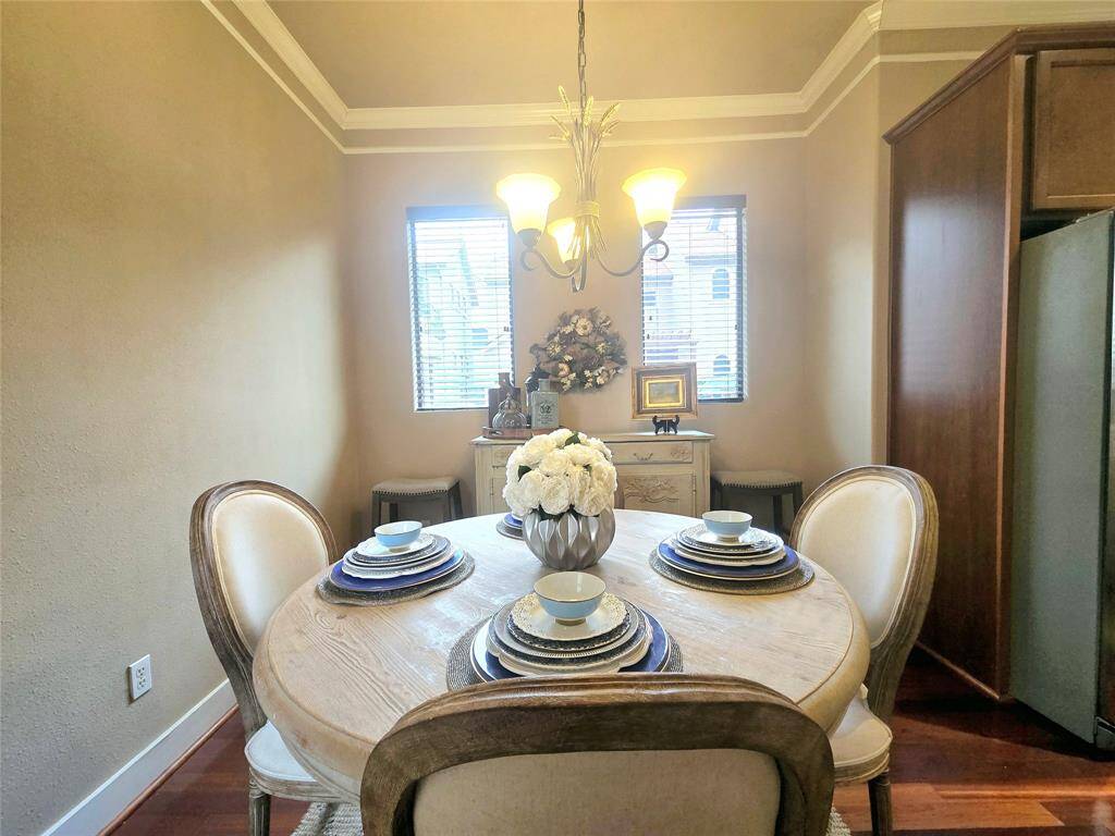 The formal dining and breakfast combo seamlessly ties in with the kitchen, creating a perfect flow for both casual meals and elegant entertaining.