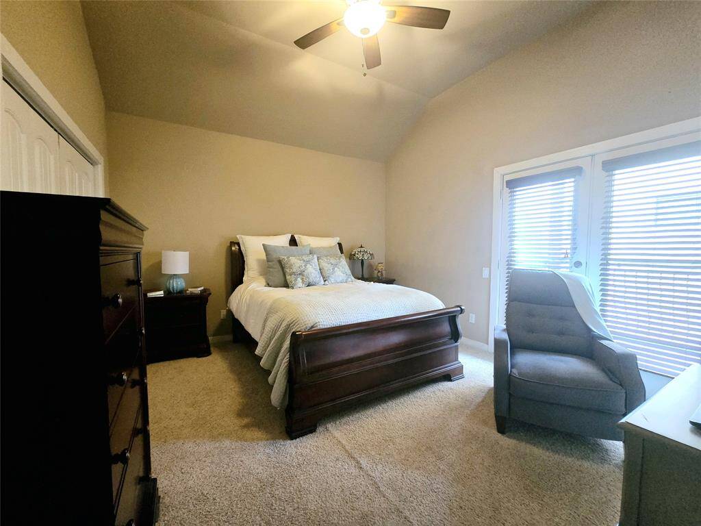 This secondary suite is perfect for late evenings, featuring access to a cozy balcony, ideal for relaxing and unwinding.