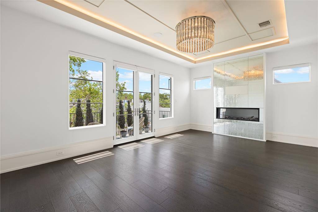 Primary bedroom with private balcony