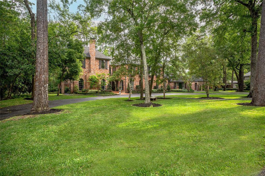 Enjoy some privacy with this heavily wooded Estate!