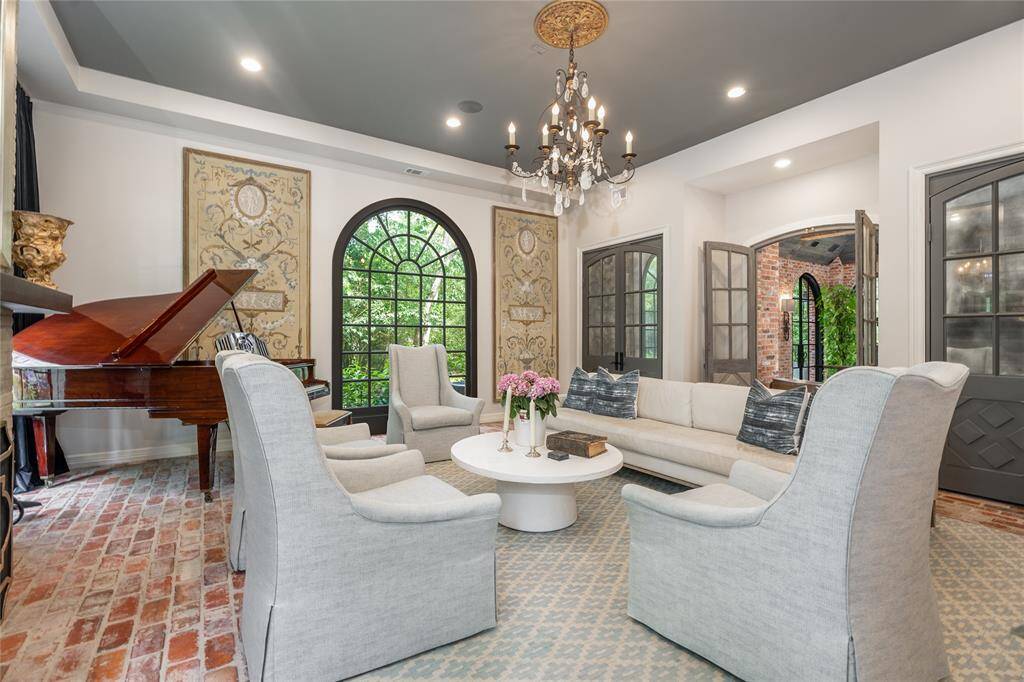 Surround yourself with natural elements, and continue your conversations in the formal family room.